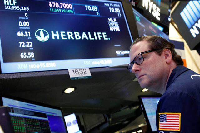Herbalife escapa de acusação de pirâmide e ações sobem Herbalife escapa de acusação de pirâmide e ações sobem