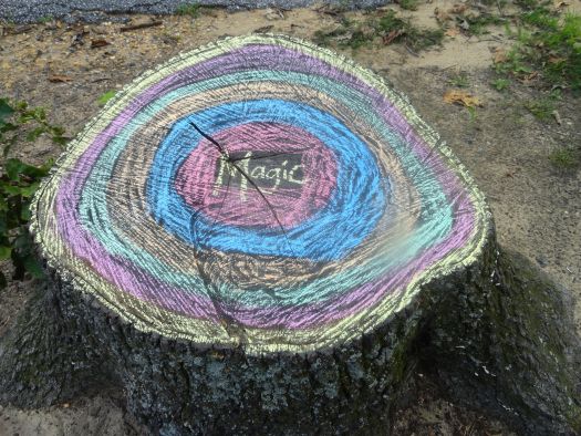 Sidewalk Chalk On A Tree Stump