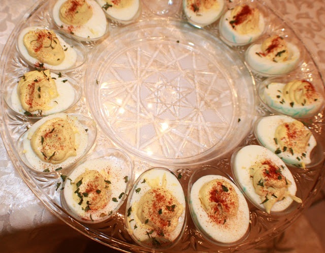 What better way to use up hard boiled eggs for an appetizer than deviled eggs these are creamy smooth hard boiled eggs with spice and a great use of Easter colored eggs