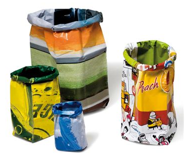 colorful wastebaskets made from old billboards, in multiples sizes