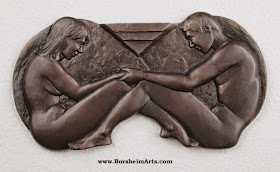 Infinity bronze bas-relief sculpture by Kelly Borsheim