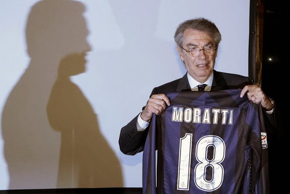 Honorary President Massimo Moratti holds an Inter Milan jersey before a news conference