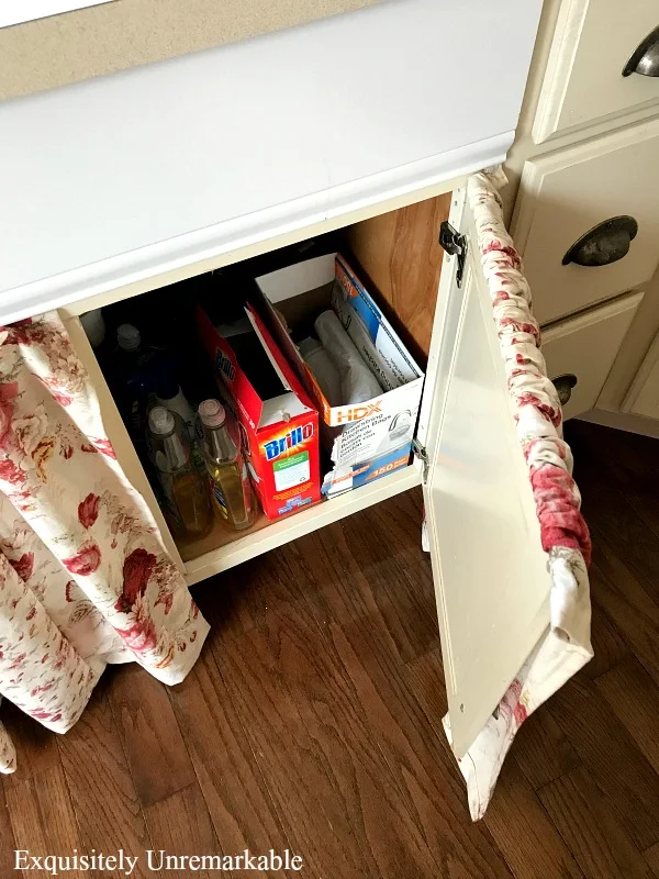 A Farmhouse Sink Skirt That Really Opens to access the cleaning supplies under the sink