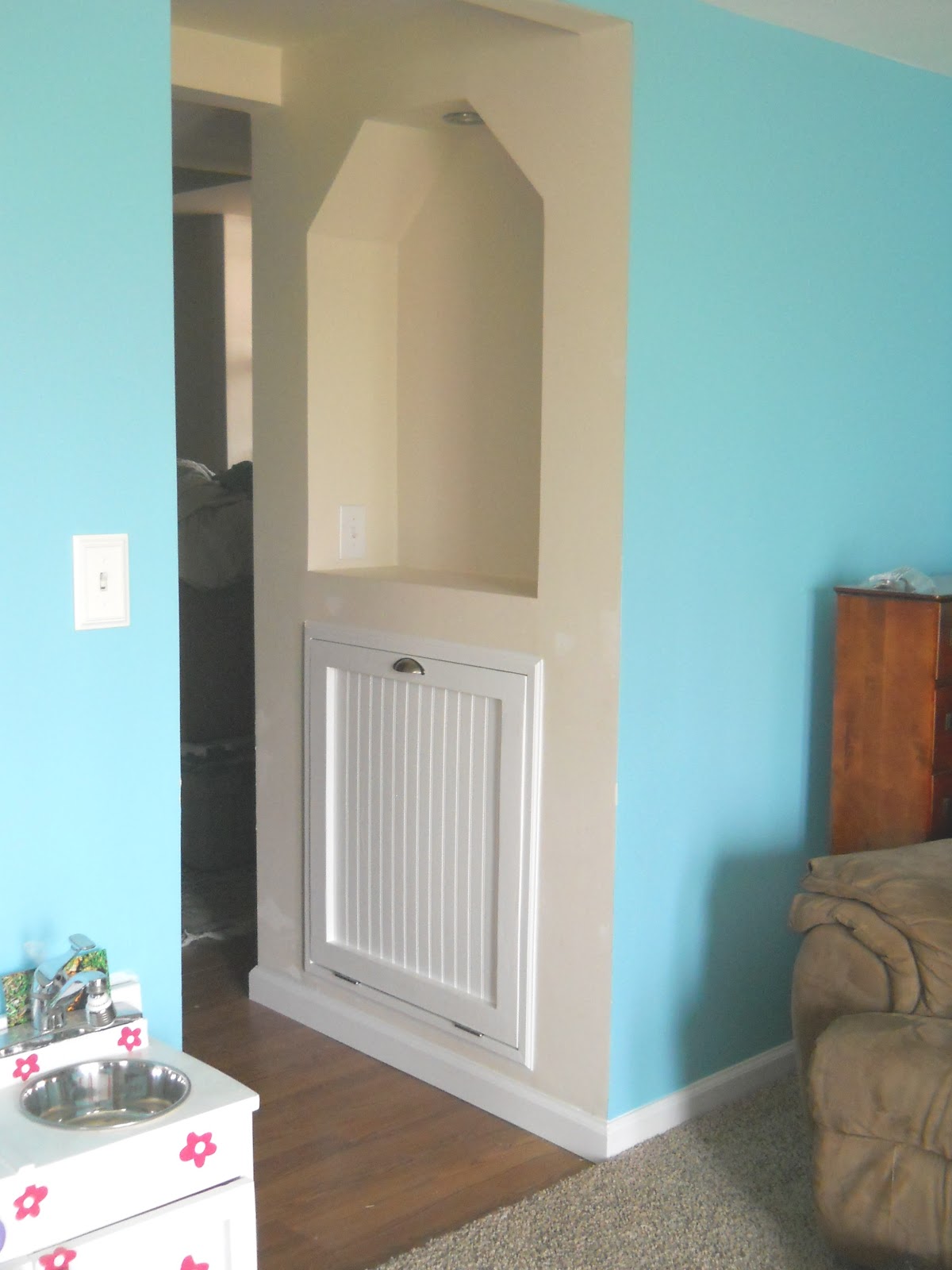 1001 Goals TV Room Hidden Blanket Storage