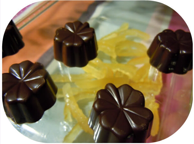 Etat de choc: Praline chocolat noir, praliné noisette et citrons confits