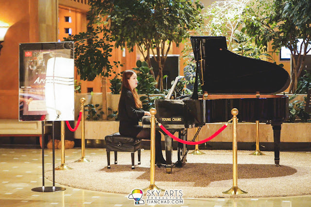 Live piano music right when we arrive Ramada Plaza Jeju Ocean Front