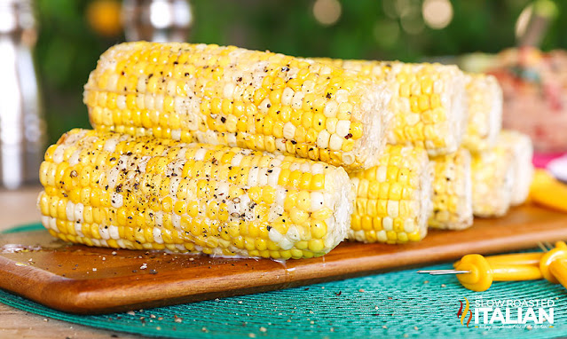 ears of sweet corn with butter and pepper