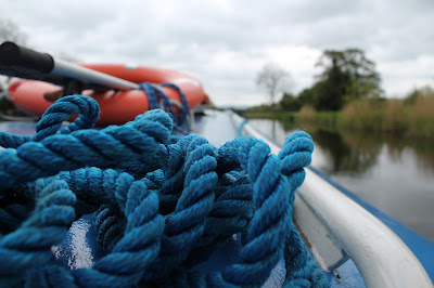 Blue rope on top of a barge