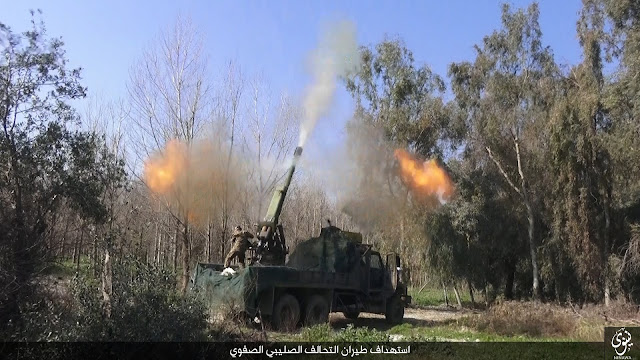 تنظيم داعش يستعمل مدفع D-30 هاوتزر عيار 122 ملم كمدفع مضاد للطائرات !! 18