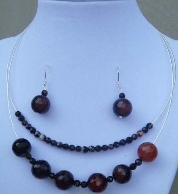 Black reddish bead set, has 2 strand necklace and silver fish hook earrings