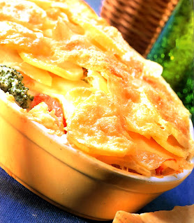 Classic layered fish pie in a baking dish, the traditional fare for Good Friday