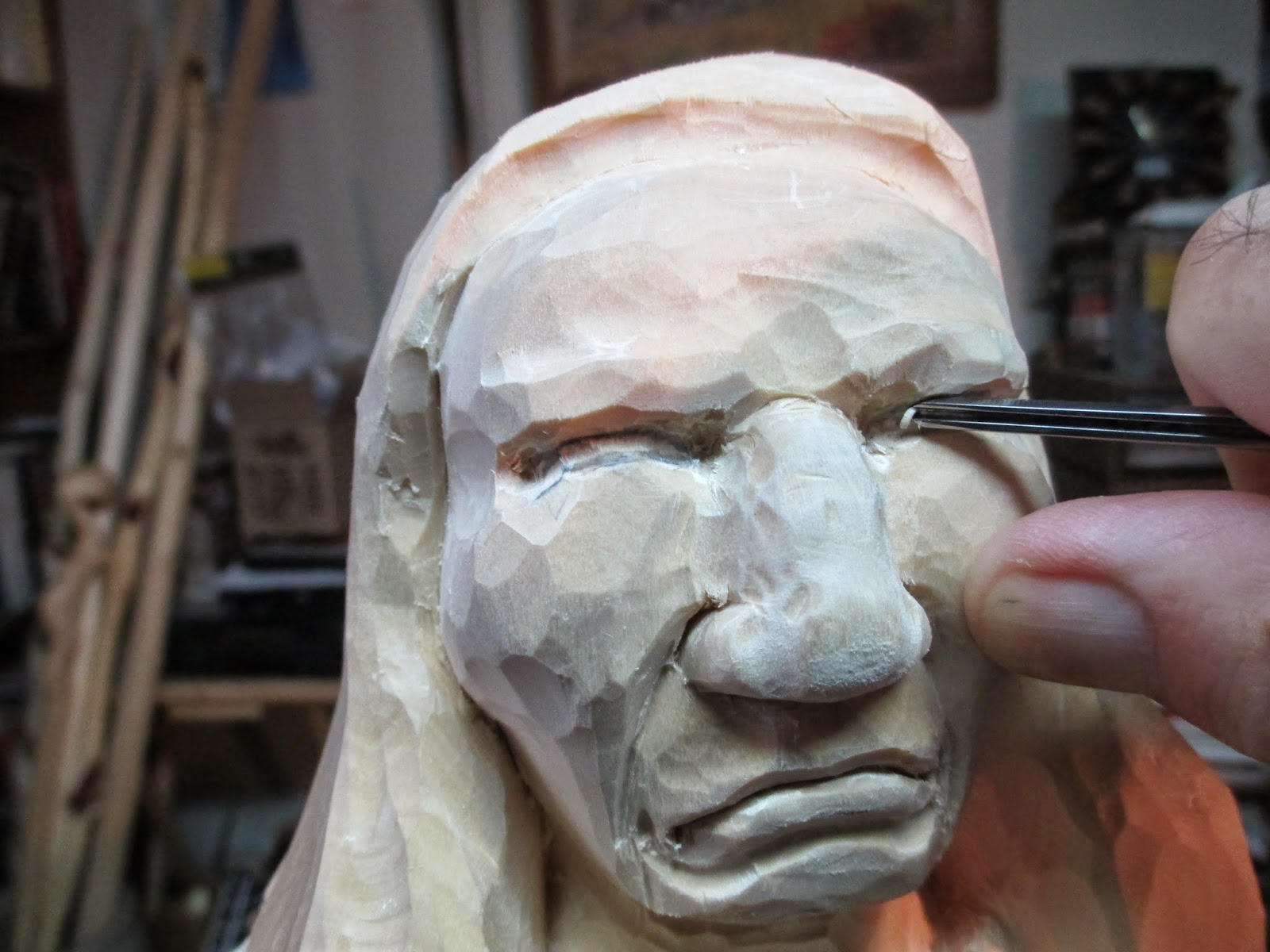 Knotty Wood Spirits Carving an Eye