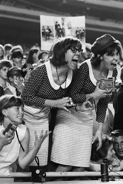 Two Beatles fans, dressing identically, screaming at a concert. Shea Stadium, Queens, New York 1965. Pirate Radio and Sealand and Other stories of Rock, Radio, and Regulations. Marchmatron.com Two Beatles fans, dressing identically, screaming at a concert. Shea Stadium, Queens, New York 1965. Pirate Radio and Sealand and Other stories of Rock, Radio, and Regulations. Marchmatron.com
