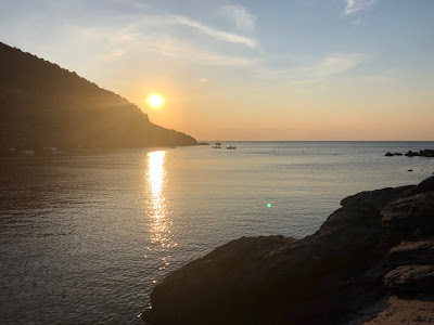 View of Nisporto beach at sunset.