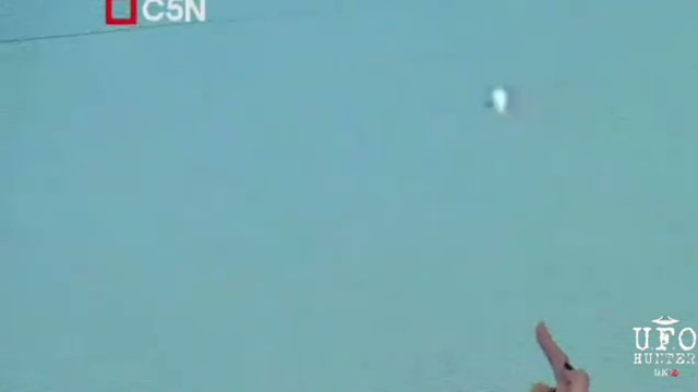 This is the Metallic and silver looking UFO shaped like a sphere over Argentina on Live TV.