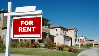An image of For Rent signboard out of house