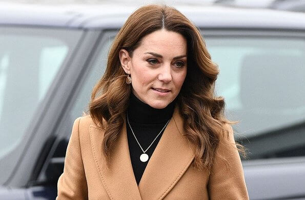 Kate Middleton wore massimo dutti cashmere wool camel coat. Kate Middleton wore Zara animal print skirt at Ely and Careau Children's Centre