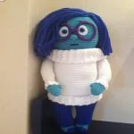 http://www.ravelry.com/patterns/library/im-a-happy-sadness-doll