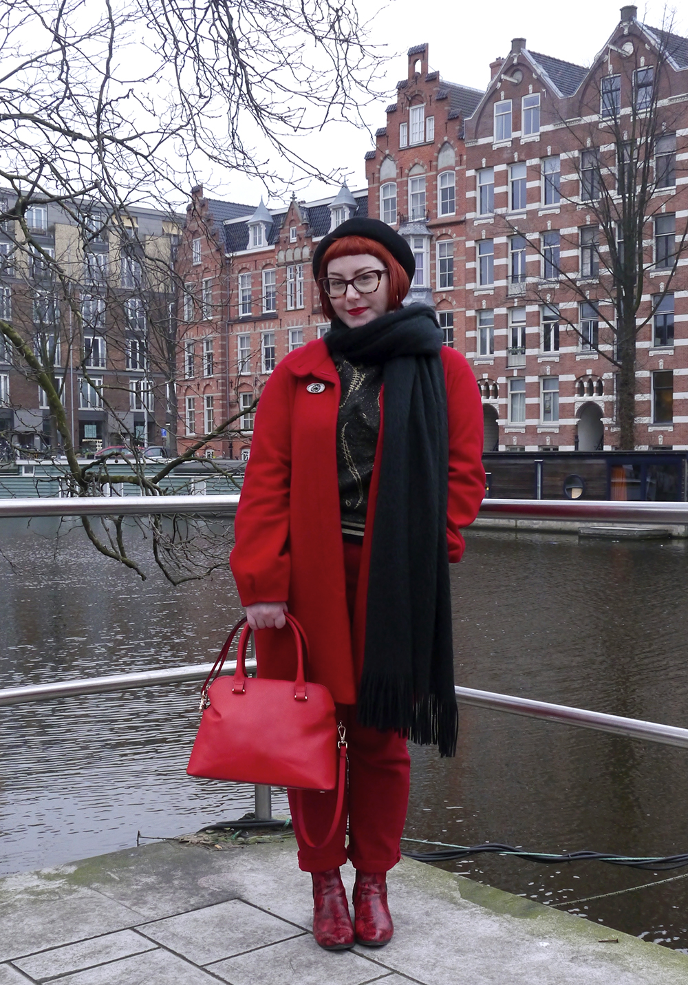 What Helen Wore in Amsterdam Bright red outfit for a grey Amsterdam day