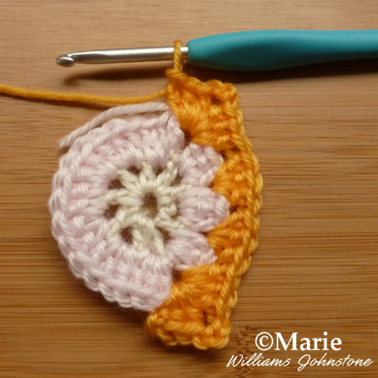 Crochet: working on 3rd round and adding in corners for triangle