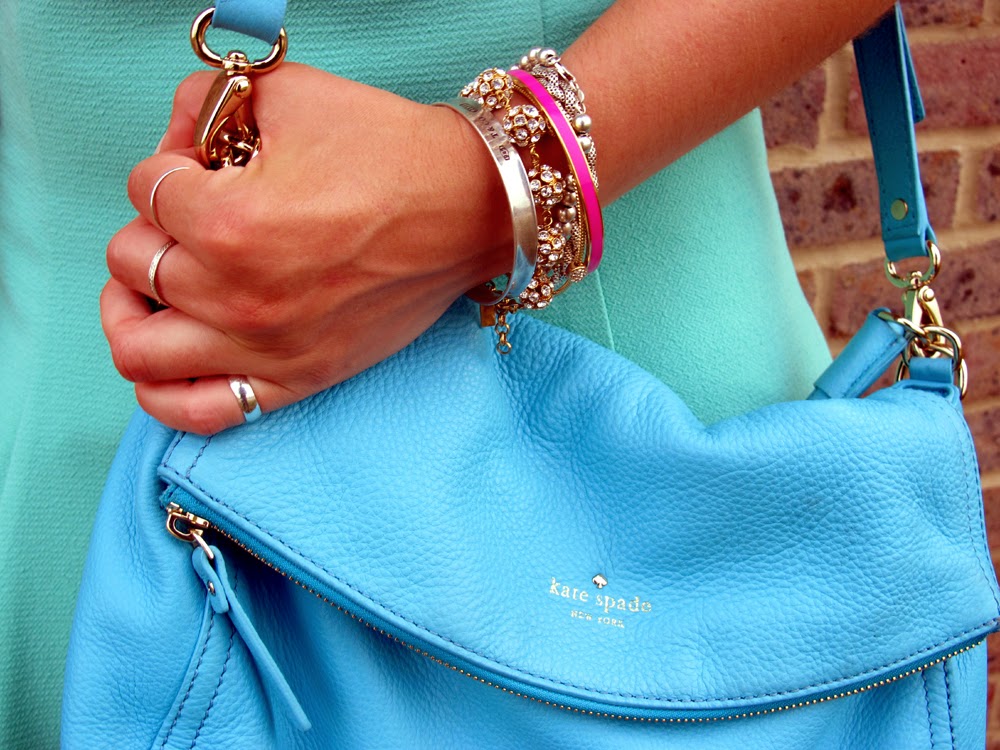 London fashion blogger Emma Louise Layla in bright blue pebble leather Kate Spade bag