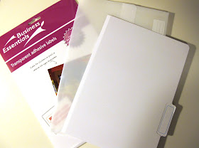 A packet of A4 clear printable stickers and a white plastic and white cardboard  folder.