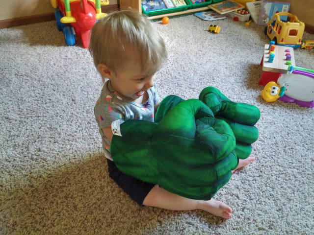 Cute little kid with Hulk hands