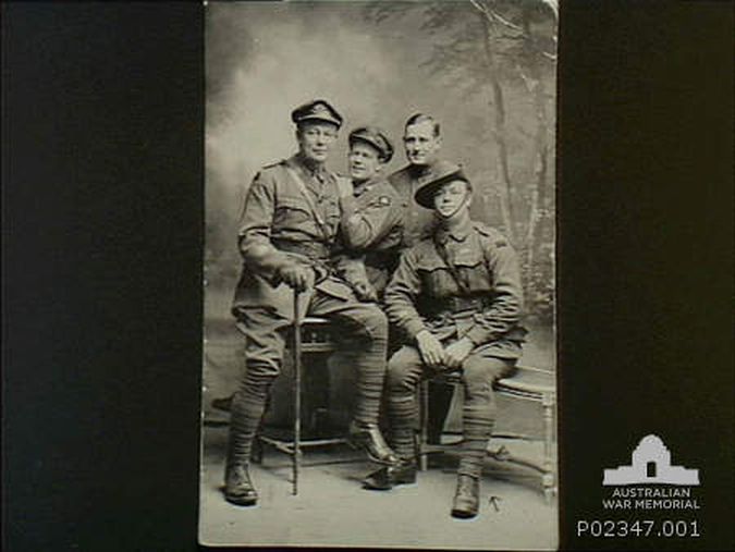 Regimental Sergeant Major Albert Henry Percy Fleming seated on right