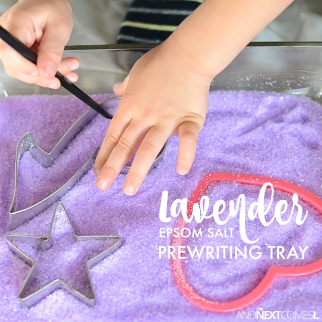 Calming lavender prewriting sensory activity and fine motor play for kids using epsom salt and cookie cutters from And Next Comes L