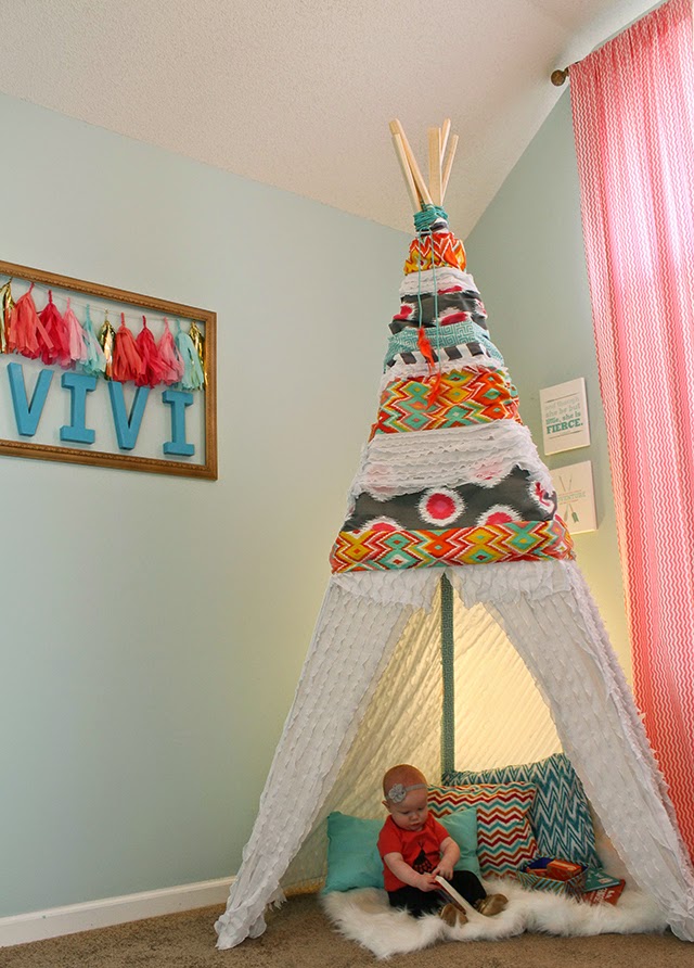 How to make a cute and easy DIY play teepee – perfect for a kid's bedroom, playroom, or reading nook! Ours is still a hit 6 years later!