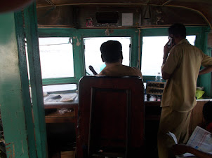 Ferry boat driver and assistant :- "Fort Kochi to Ernakulam".