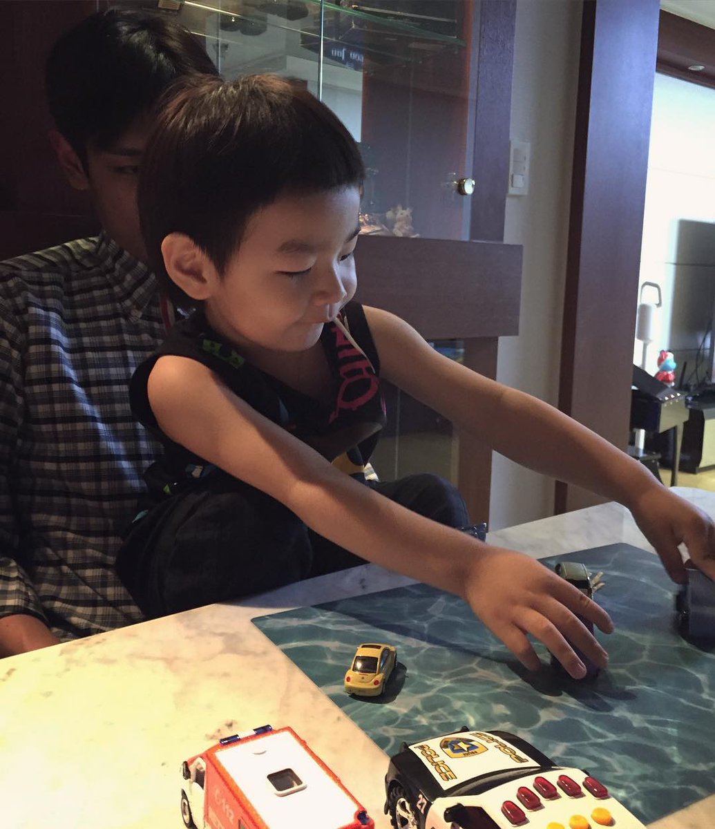 Kpop - T.O.P Has Fun With His Nephew | Kpop News And Lyrics