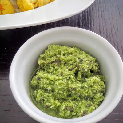 Coriander Coconut Chutney:  A slightly sweet, sour, spicy, and flavorful blend of cilantro and coconut.  A great side to enhance just about any Indian meal or a snack for dipping naan.