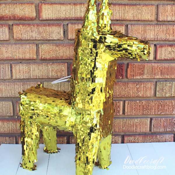 The perfect golden loot llama donkey pinata for a fortnite birthday party