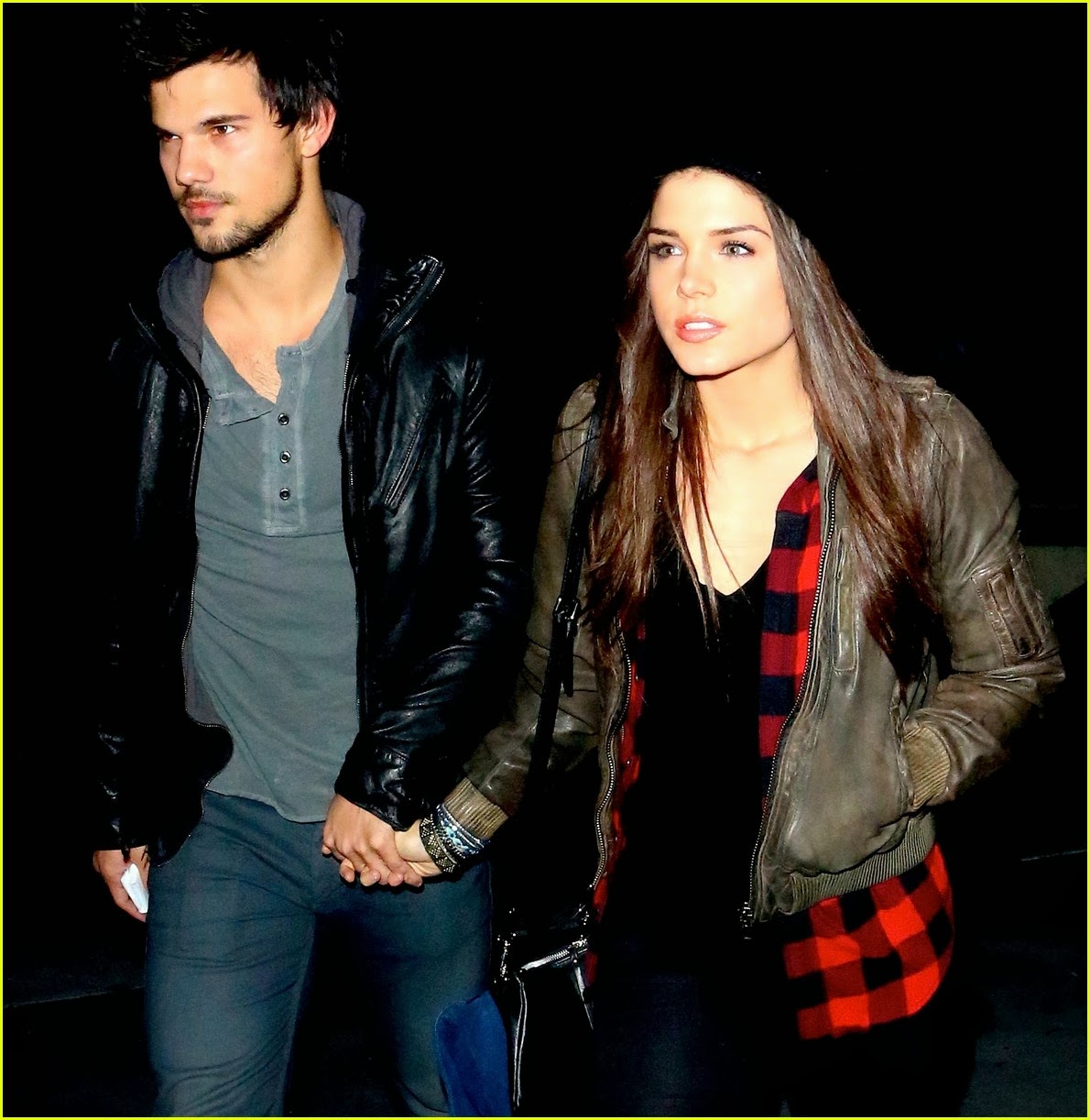 taylor-lautner-marie-avgeropoulos-jay-z-concert-goers-02