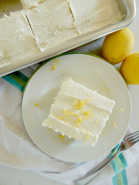 Lemon Zucchini Cake with Lemon Buttercream Frosting...all the flavors of summer in one cake!  Juicy lemons, shredded zucchini and a delicious buttercream frosting! (sweetandsavoryfood.com)