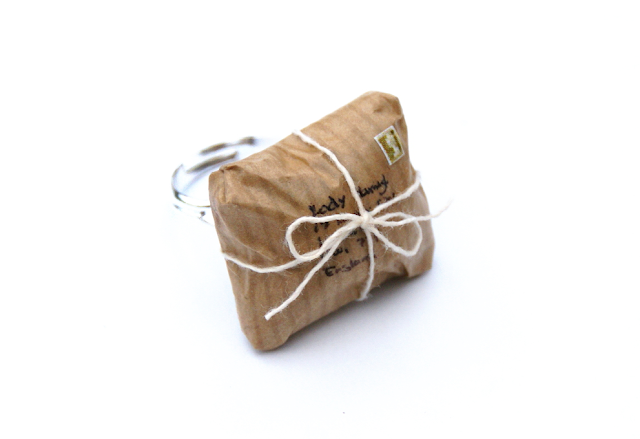 https://www.etsy.com/uk/listing/170485643/miniature-brown-parcel-ring-postal-ring
