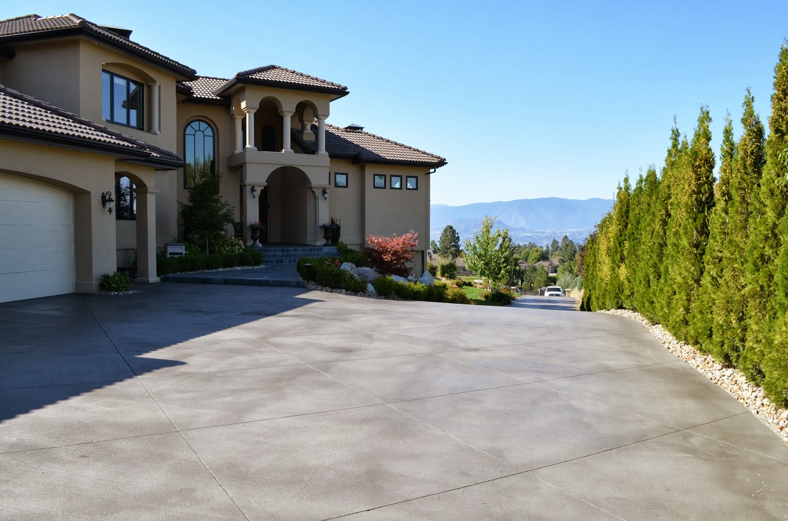 MODE CONCRETE How often should you seal your driveway? Concrete