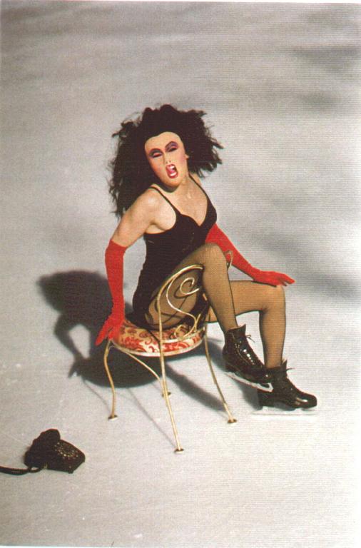 Photograph of Greg Wittrock performing a figure skating drag act as Whorita