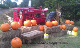 Eclectic Red Barn: Old farm tractor and pumpkin display