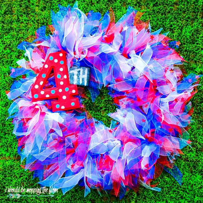 Budget-Friendly Fourth of July Wreath | This patriotic wreath was made out of hair ties! Super easy way to create a budget-friendly wreath for the summertime.