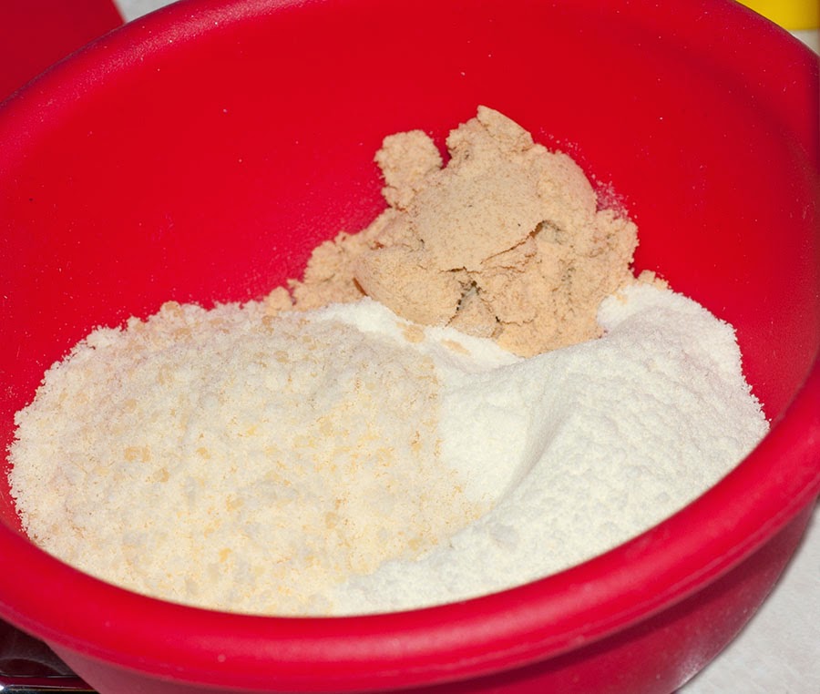 Small red bowl with measured and dried ingredients.