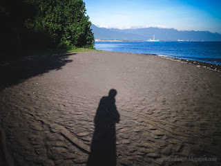 Beach Scene With Shadow Of Someone On The Sand Beach In The Morning At Umeanyar Village North Bali Indonesia