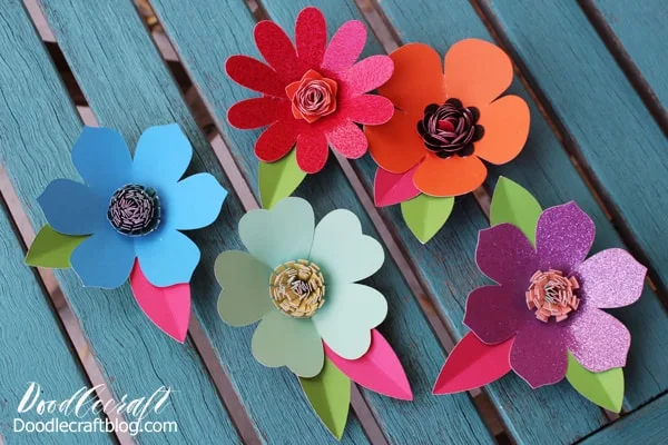 Bright paper flowers cut using the Cricut Maker out of DCWV double sided cardstock stack.