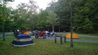 Tents and motorcycles among trees at Hungry Mother State Park