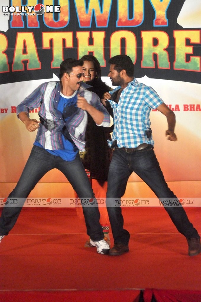  Sonakshi sinha in yellow suit kameez, orange salwaar -  Sonakshi sinha Yellow Suit Rowdy Rathore First look launch 