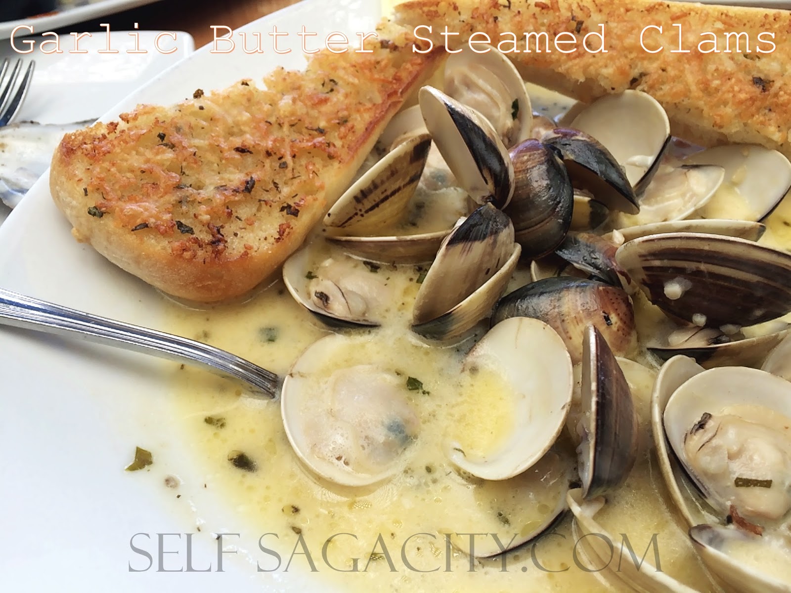 Steamed Clams in Garlic & Butter Sauce