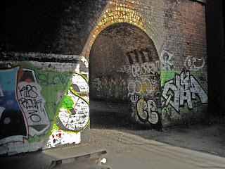 <img src="Arches near the A57 Inner Ring Rd, Salford.jpeg" alt="urban photography, old buildings, railway arches">