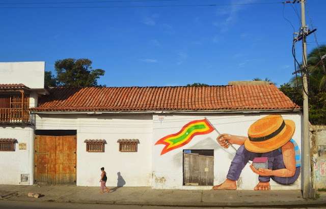 Street Art by Peruvian Artist JADE on the streets of Cartagena in Colombia. 4