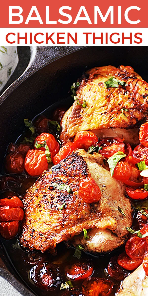 Balsamic Chicken Thighs with Tomatoes in a cast iron skillet ready to serve and enjoy